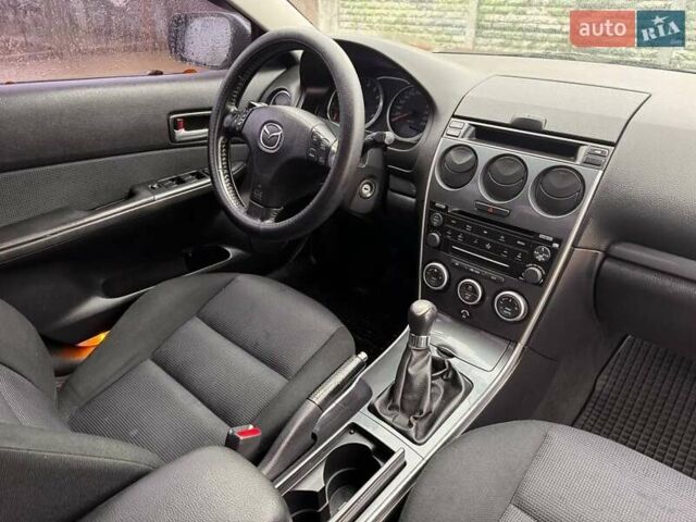 Сірий Мазда 3, об'ємом двигуна 2 л та пробігом 171 тис. км за 5600 $, фото 10 на Automoto.ua