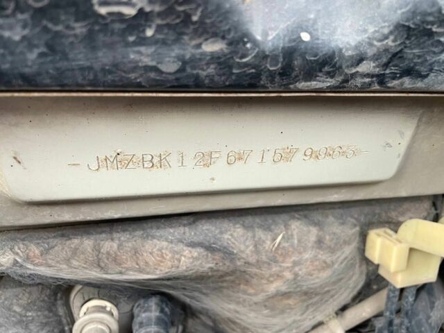 Серый Мазда 3, объемом двигателя 2 л и пробегом 184 тыс. км за 5400 $, фото 23 на Automoto.ua