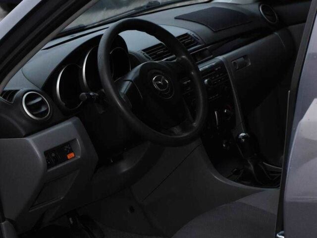 Серый Мазда 3, объемом двигателя 1.6 л и пробегом 180 тыс. км за 3850 $, фото 6 на Automoto.ua