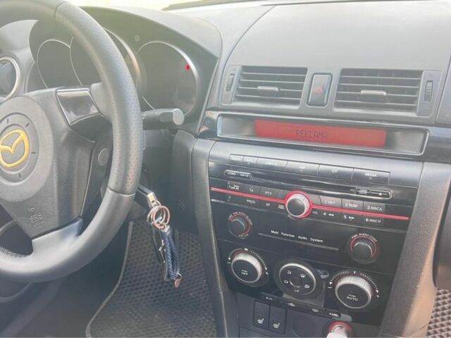 Сірий Мазда 3, об'ємом двигуна 1.6 л та пробігом 203 тис. км за 5300 $, фото 4 на Automoto.ua