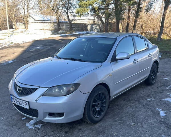 Серый Мазда 3, объемом двигателя 1.6 л и пробегом 212 тыс. км за 2700 $, фото 1 на Automoto.ua