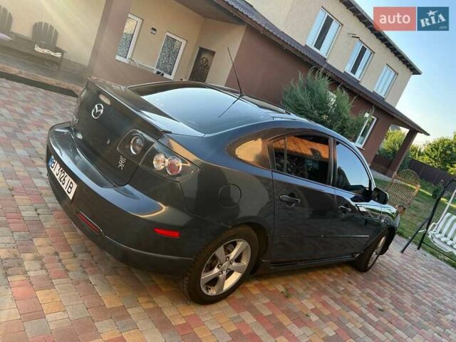 Серый Мазда 3, объемом двигателя 1.6 л и пробегом 196 тыс. км за 6000 $, фото 4 на Automoto.ua