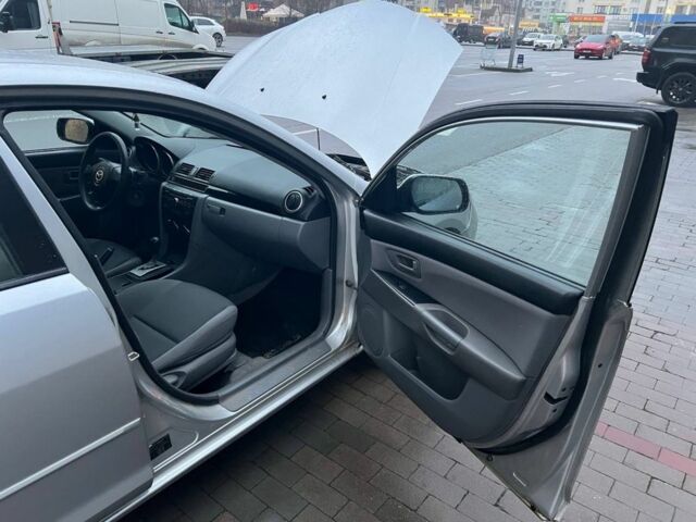 Серый Мазда 3, объемом двигателя 1.6 л и пробегом 300 тыс. км за 3999 $, фото 12 на Automoto.ua