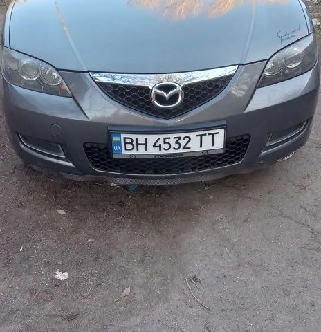 Серый Мазда 3, объемом двигателя 1.6 л и пробегом 288 тыс. км за 5000 $, фото 2 на Automoto.ua