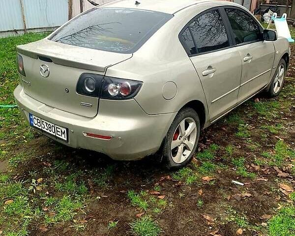 Серый Мазда 3, объемом двигателя 2 л и пробегом 307 тыс. км за 5250 $, фото 1 на Automoto.ua