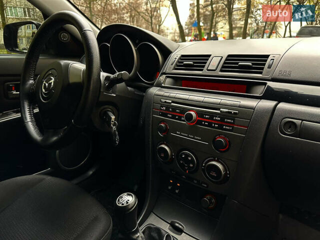 Сірий Мазда 3, об'ємом двигуна 2 л та пробігом 189 тис. км за 4750 $, фото 19 на Automoto.ua