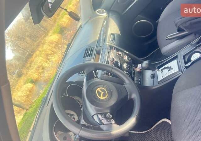Сірий Мазда 3, об'ємом двигуна 1.6 л та пробігом 203 тис. км за 5300 $, фото 5 на Automoto.ua