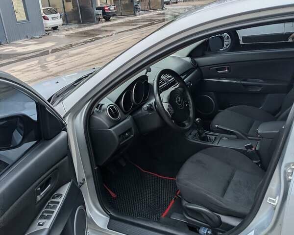 Сірий Мазда 3, об'ємом двигуна 1.6 л та пробігом 200 тис. км за 4900 $, фото 12 на Automoto.ua