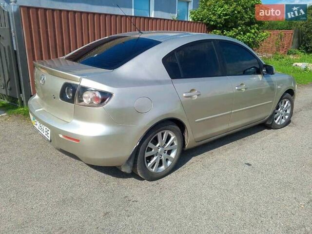 Серый Мазда 3, объемом двигателя 1.6 л и пробегом 186 тыс. км за 5000 $, фото 8 на Automoto.ua