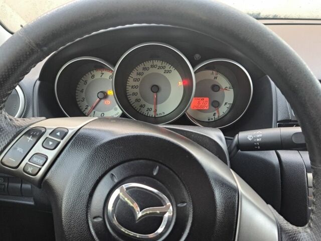 Серый Мазда 3, объемом двигателя 1.6 л и пробегом 147 тыс. км за 5500 $, фото 9 на Automoto.ua