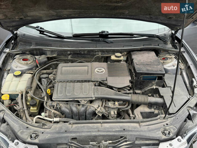 Серый Мазда 3, объемом двигателя 1.6 л и пробегом 178 тыс. км за 5800 $, фото 39 на Automoto.ua