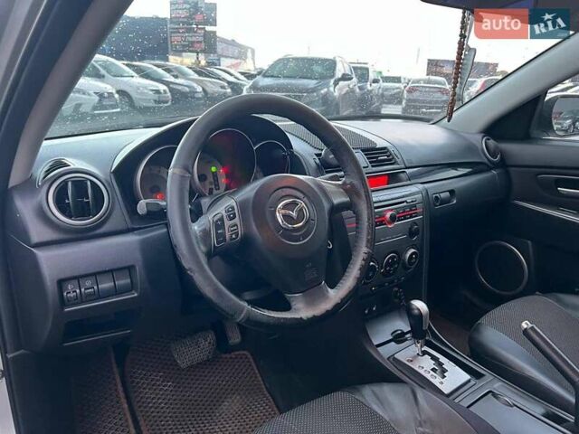 Серый Мазда 3, объемом двигателя 1.6 л и пробегом 305 тыс. км за 5940 $, фото 15 на Automoto.ua
