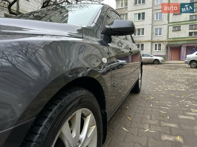 Сірий Мазда 3, об'ємом двигуна 2 л та пробігом 189 тис. км за 4750 $, фото 4 на Automoto.ua