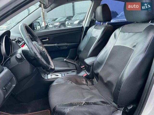 Серый Мазда 3, объемом двигателя 1.6 л и пробегом 305 тыс. км за 5940 $, фото 28 на Automoto.ua