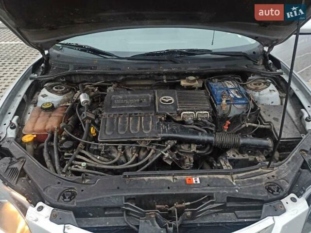 Серый Мазда 3, объемом двигателя 1.6 л и пробегом 300 тыс. км за 3800 $, фото 10 на Automoto.ua