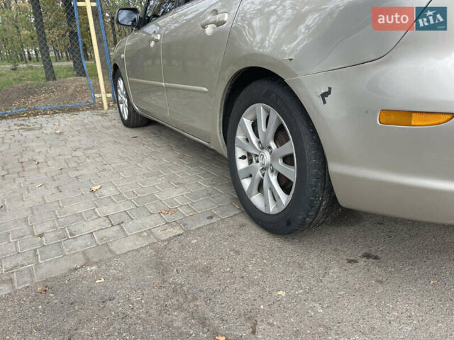 Серый Мазда 3, объемом двигателя 1.6 л и пробегом 170 тыс. км за 5200 $, фото 7 на Automoto.ua