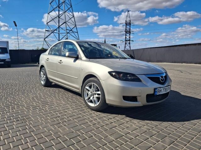 Серый Мазда 3, объемом двигателя 1.6 л и пробегом 147 тыс. км за 5500 $, фото 1 на Automoto.ua