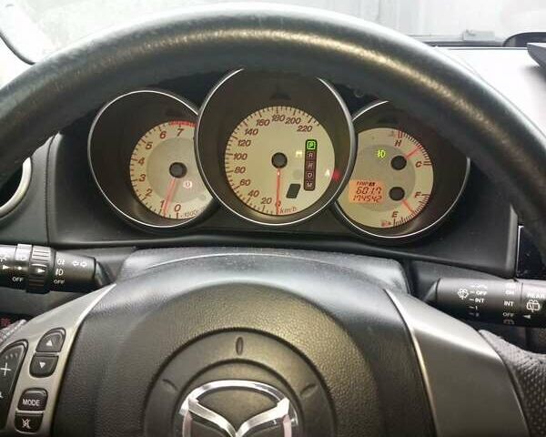 Серый Мазда 3, объемом двигателя 1.6 л и пробегом 175 тыс. км за 5500 $, фото 2 на Automoto.ua