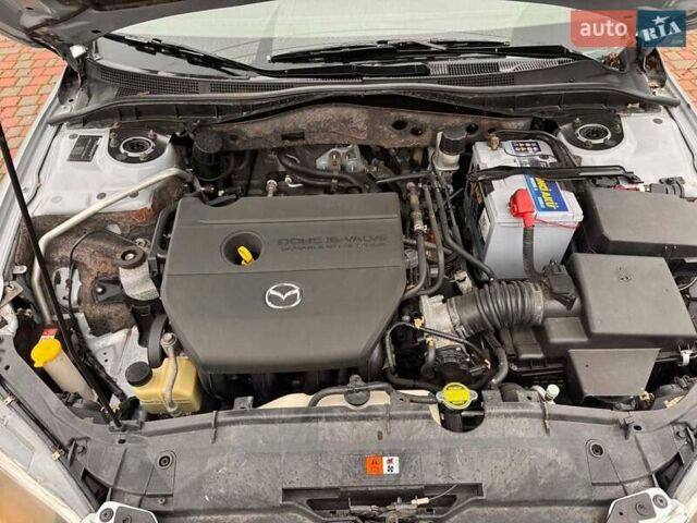 Сірий Мазда 3, об'ємом двигуна 2 л та пробігом 171 тис. км за 5600 $, фото 16 на Automoto.ua