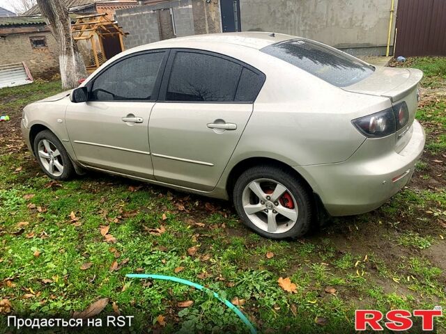 Серый Мазда 3, объемом двигателя 2 л и пробегом 307 тыс. км за 5250 $, фото 3 на Automoto.ua