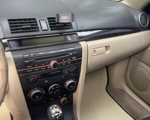 Серый Мазда 3, объемом двигателя 1.6 л и пробегом 170 тыс. км за 5200 $, фото 22 на Automoto.ua