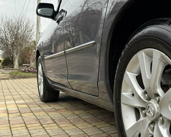 Серый Мазда 3, объемом двигателя 1.6 л и пробегом 178 тыс. км за 5800 $, фото 27 на Automoto.ua