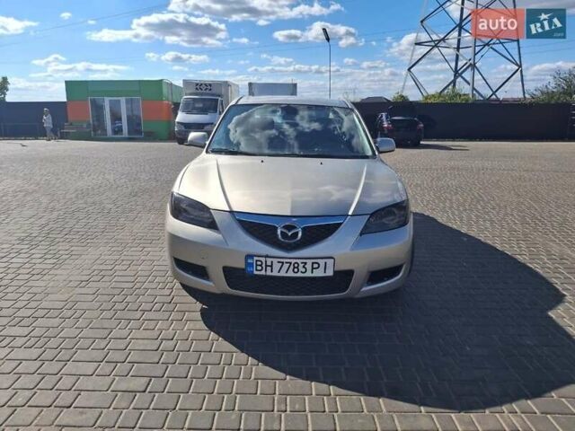 Серый Мазда 3, объемом двигателя 1.6 л и пробегом 147 тыс. км за 5500 $, фото 1 на Automoto.ua