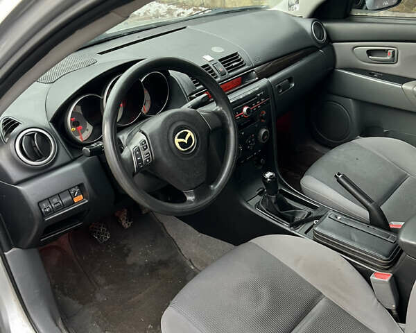 Серый Мазда 3, объемом двигателя 1.6 л и пробегом 212 тыс. км за 2700 $, фото 6 на Automoto.ua