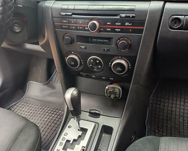 Серый Мазда 3, объемом двигателя 1.6 л и пробегом 196 тыс. км за 6000 $, фото 9 на Automoto.ua