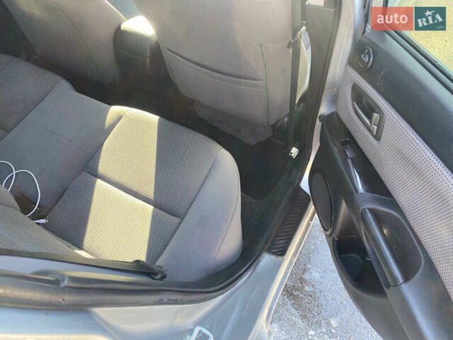 Серый Мазда 3, объемом двигателя 1.6 л и пробегом 260 тыс. км за 4900 $, фото 9 на Automoto.ua