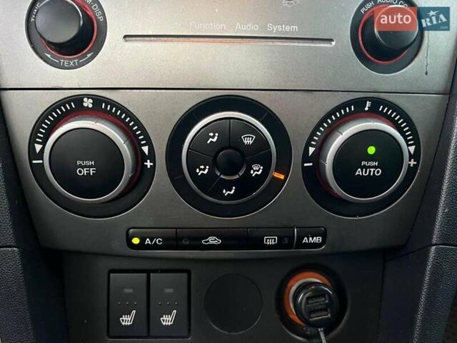 Серый Мазда 3, объемом двигателя 1.6 л и пробегом 305 тыс. км за 5940 $, фото 24 на Automoto.ua