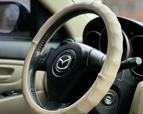 Сірий Мазда 3, об'ємом двигуна 1.6 л та пробігом 170 тис. км за 5200 $, фото 9 на Automoto.ua