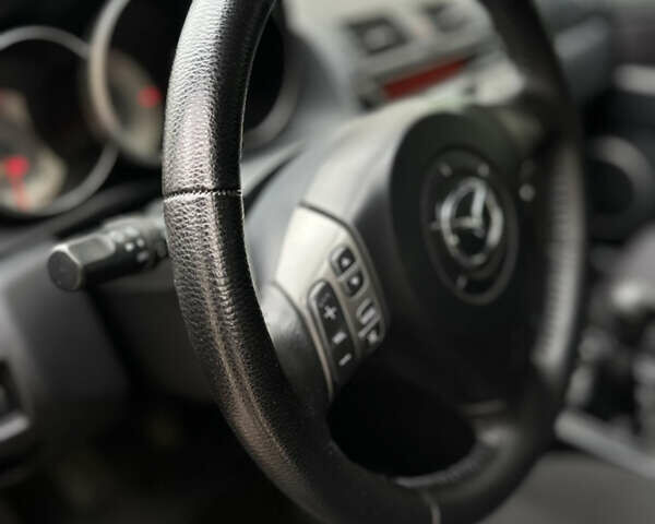 Сірий Мазда 3, об'ємом двигуна 2 л та пробігом 189 тис. км за 4750 $, фото 17 на Automoto.ua