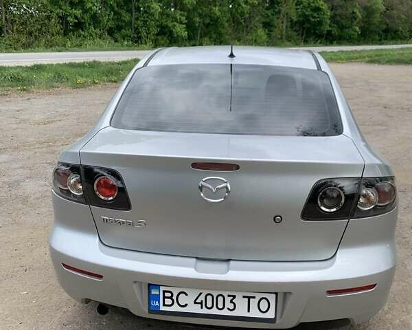 Серый Мазда 3, объемом двигателя 1.6 л и пробегом 285 тыс. км за 5700 $, фото 3 на Automoto.ua
