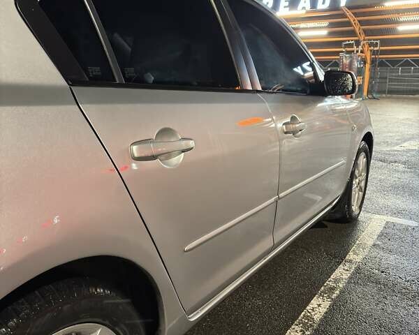 Сірий Мазда 3, об'ємом двигуна 1.6 л та пробігом 172 тис. км за 5600 $, фото 4 на Automoto.ua