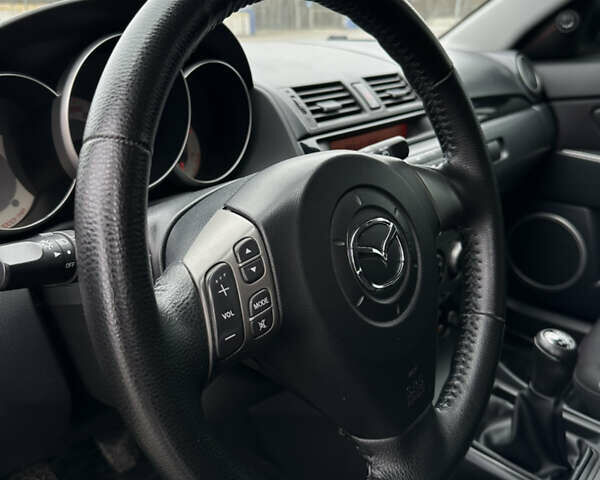 Серый Мазда 3, объемом двигателя 2 л и пробегом 188 тыс. км за 4999 $, фото 18 на Automoto.ua
