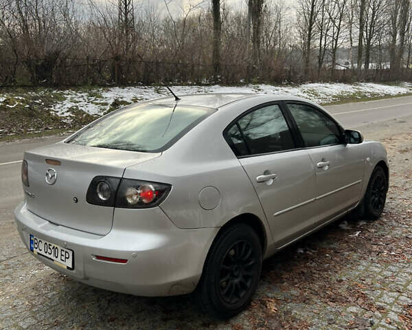 Серый Мазда 3, объемом двигателя 1.6 л и пробегом 212 тыс. км за 2700 $, фото 3 на Automoto.ua