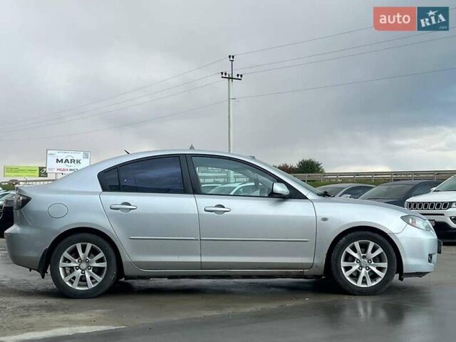 Серый Мазда 3, объемом двигателя 1.6 л и пробегом 305 тыс. км за 5940 $, фото 9 на Automoto.ua