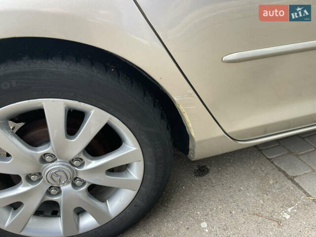 Серый Мазда 3, объемом двигателя 1.6 л и пробегом 170 тыс. км за 5200 $, фото 11 на Automoto.ua