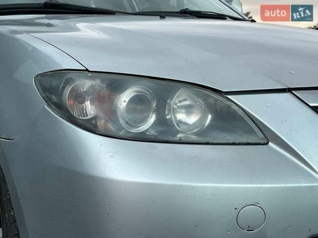 Серый Мазда 3, объемом двигателя 1.6 л и пробегом 305 тыс. км за 5940 $, фото 12 на Automoto.ua