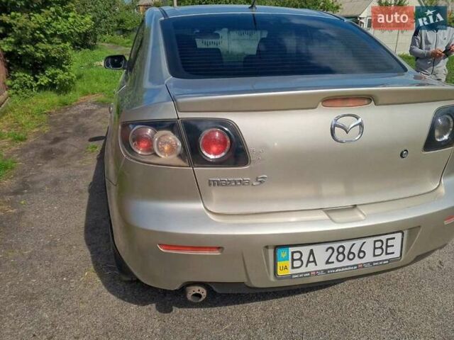 Серый Мазда 3, объемом двигателя 1.6 л и пробегом 186 тыс. км за 5000 $, фото 7 на Automoto.ua