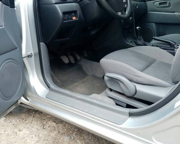Сірий Мазда 3, об'ємом двигуна 1.6 л та пробігом 212 тис. км за 2800 $, фото 4 на Automoto.ua