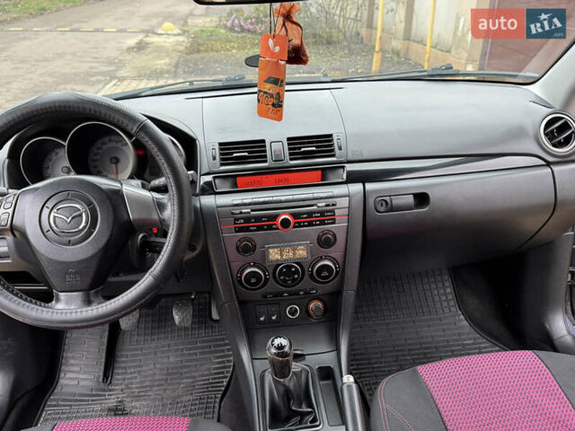 Серый Мазда 3, объемом двигателя 1.6 л и пробегом 178 тыс. км за 5800 $, фото 33 на Automoto.ua