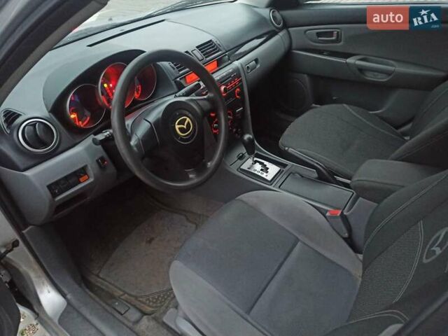 Серый Мазда 3, объемом двигателя 1.6 л и пробегом 300 тыс. км за 3800 $, фото 8 на Automoto.ua