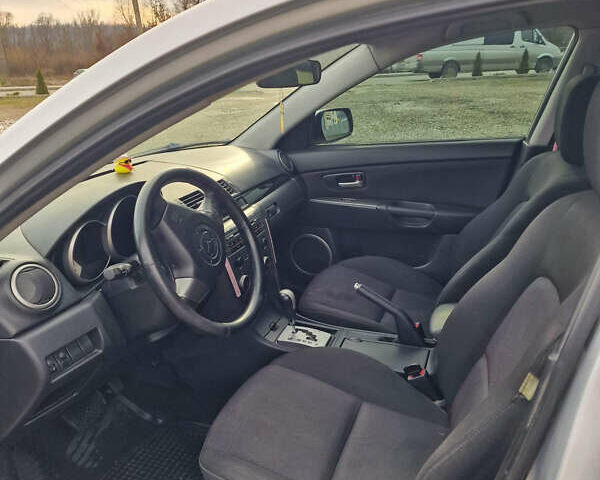 Серый Мазда 3, объемом двигателя 1.6 л и пробегом 223 тыс. км за 3950 $, фото 4 на Automoto.ua