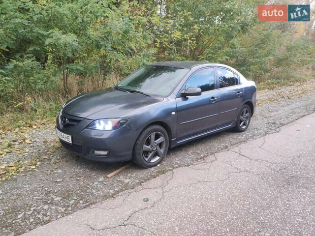 Серый Мазда 3, объемом двигателя 2 л и пробегом 318 тыс. км за 2100 $, фото 7 на Automoto.ua