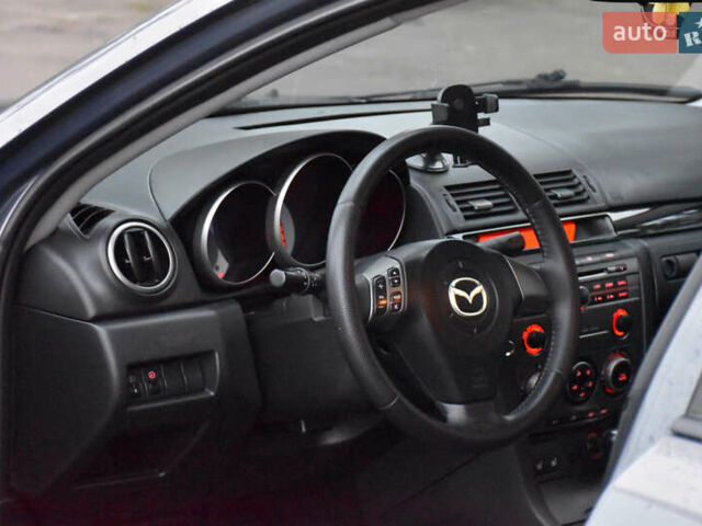 Серый Мазда 3, объемом двигателя 1.6 л и пробегом 128 тыс. км за 6100 $, фото 7 на Automoto.ua