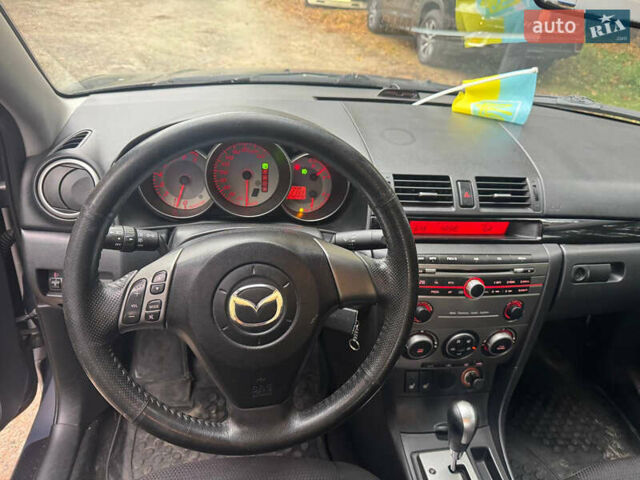 Серый Мазда 3, объемом двигателя 1.6 л и пробегом 242 тыс. км за 5800 $, фото 6 на Automoto.ua