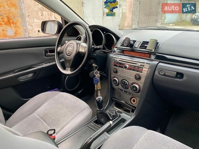 Сірий Мазда 3, об'ємом двигуна 1.6 л та пробігом 288 тис. км за 4499 $, фото 15 на Automoto.ua