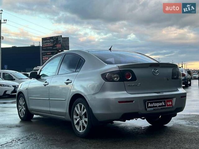 Серый Мазда 3, объемом двигателя 1.6 л и пробегом 305 тыс. км за 5940 $, фото 5 на Automoto.ua